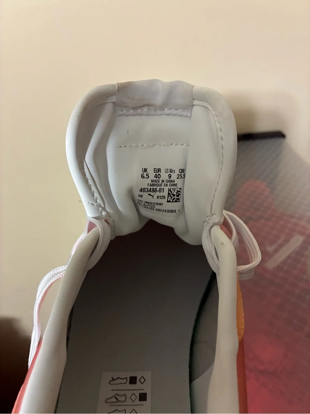 Puma women’s White and Orange Casual Sneakers
